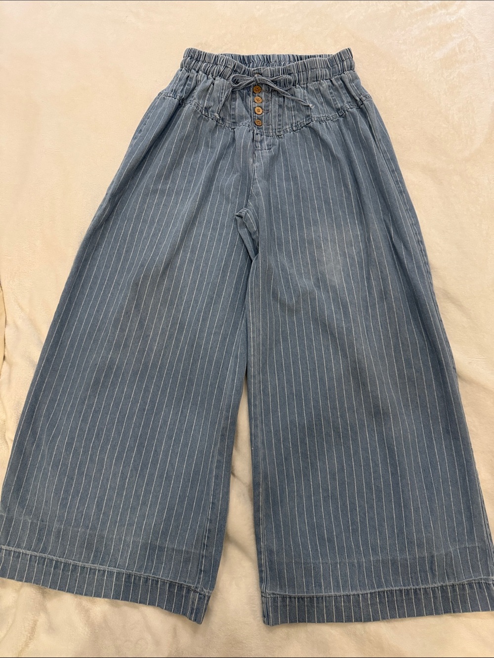 Pinstripe Wide Leg Drawstring Jeans- imperfection: hem tape on inside of legs